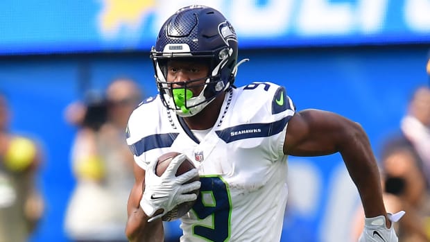 Seattle Seahawks running back Kenneth Walker III (9) runs the ball against the Los Angeles Chargers during the first half at SoFi Stadium.
